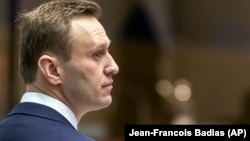 Russian opposition activist Aleksei Navalny stands at the European Court of Human Rights in Strasbourg in January.