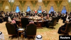 File photo-Heads of States of the Gulf Cooperation Council sit at a round table in Bayan Palace for the opening session of the 34th GCC Summit hosted by Kuwait