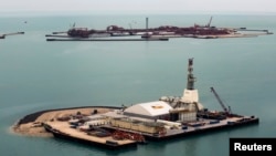 An aerial view shows artificial islands on the Kashagan offshore oil field in the Caspian Sea.