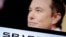 Илон Маск менен SpaceX эн белгиси 