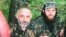 In this undated photo, Zelimkhan Khangoshvili (right) is shown seated alongside Aslan Maskhadov, who served briefly as president of Chechnya in the 1990s.