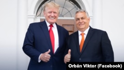 Donald Trump (left) and Viktor Orban ppose for a photo in New Jersey in August 2022.