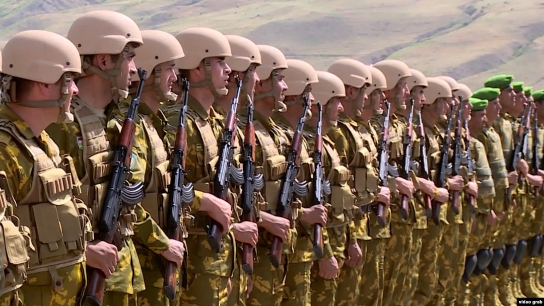 Tajik troops in the volatile Shamsiddin Shohin district bordering Afghanistan (file photo) 