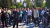 Участники акции протеста 1 мая в Алматы.
