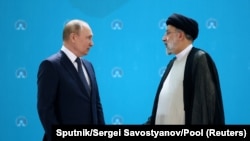 Președintele Federației Ruse, Vladimir Putin, și președintele Iranului, Ebrahim Raisi 