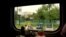 view from the window of a train in Irpin