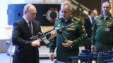 Президент РФ Владимир Путин и министр обороны РФ Сергей Шойгу 