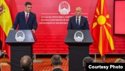 Spanish Prime Minister Pedro Sanchez (left) offers his backing for North Macedonia's EU bid in a news conference with Prime Minister Dimitar Kovachevski. 