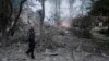 A man walks in front of a damaged school after a Russian missile strike hit the city of Kramatorsk on July 21.