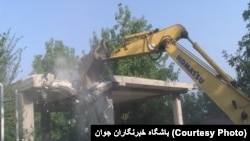 Buildings belonging to Baha'is in Roshankooh, northern Iran, are destroyed earlier this month. 