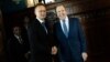 Hungarian Foreign Minister Peter Szijjarta (left) greets his Russian counterpart, Sergei Lavrov, during a visit to Moscow in July.