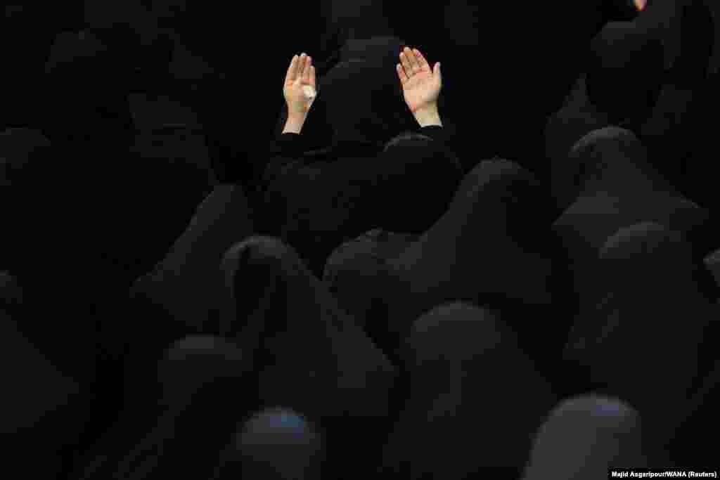 Iranian Shi&#39;ite Muslim women take part in a mourning ritual ahead of Ashura, the holiest day on the Shi&#39;ite Muslim calendar, in Tehran.