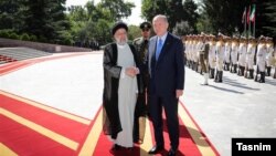 Președintele iranian Ebrahim Raeesi și omologul său turc Recep Tayyip Erdogan, Teheran, 19 iulie 2022/