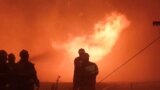 Pompierii sting un incendiu, în Hrensko, Republica Cehă, 26 iulie 2022