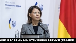 German Foreign Minister Annalena Baerbock speaks at a news conference in Kyiv in September.