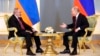 Russian President Vladimir Putin (right) meets Armenian Prime Minister Nikol Pashinian at the Kremlin on May 8.