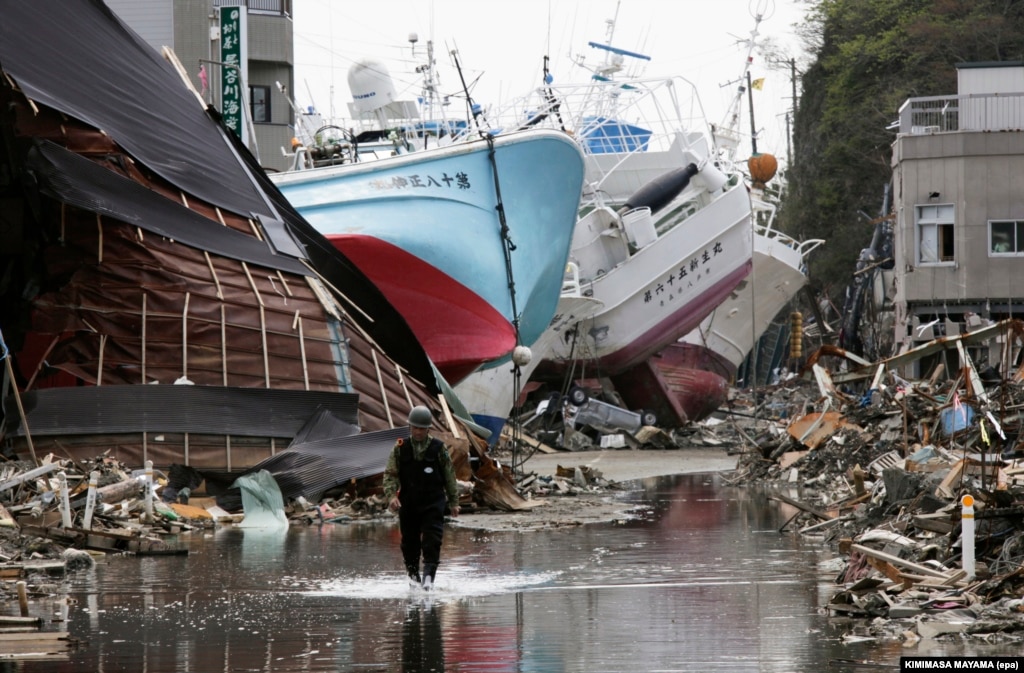 Tsunami Waves Hit Japan's Northeast After Large Earthquake