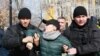Kazakhstan - Kazakh police detain a protestor in Almaty, southeastern Kazakhstan, on February 22, 2020. - Police in Kazakhstan detained up to a hundred activists Saturday after two opposition groups announced plans to hold anti-government protests in the 