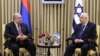 Isael- Israeli President Reuven Rivlin (R) and his Armenian counterpart Armen Sarkissian meet in Tel Aviv, March 22, 2020.