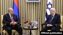 Isael- Israeli President Reuven Rivlin (R) and his Armenian counterpart Armen Sarkissian meet in Tel Aviv, March 22, 2020.