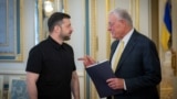 Украина: Орусия чабуулун улантты, Траптын чабарманы Киевге барды 