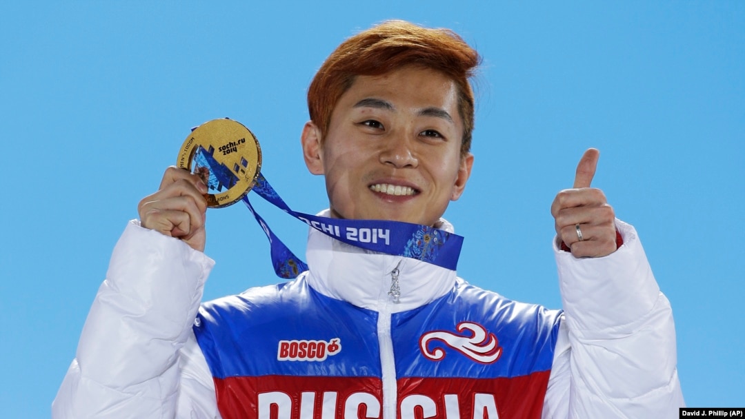Men's 1,000-meter short-track speed-skating gold medalist Viktor Ahn of Russia holds his medal during the medals ceremony at the Winter Olympics in Sochi in February 2014.