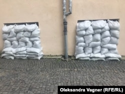 Sandbags in the windows of a government building in Uzhhorod