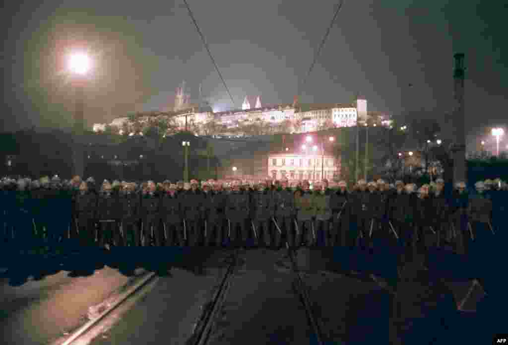 Riot police block a bridge to prevent protesters marching to Prague Castle, the seat of the Czechoslovak president on November 19.&nbsp;The demonstrations were growing rapidly, fueled by shock at authorities&#39; brutal use of force on the first night.