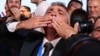 Ilija Srdanovic of the Students' List celebrates as preliminary results were announced on October 25.
