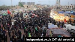 İraqın Kərbəla şəhərində Məhəmməd peyğəmbərin nəvəsi İmam Hüseynin qırx mərasimi (AFP)