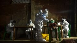 Medicinski radnici testiraju ljude na prisustvo korona virusa, Kolkata