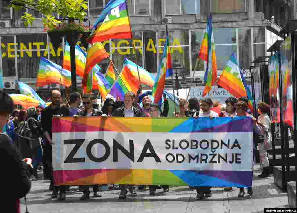 Marchers carry a sign declaring a &quot;hatred-free zone.&quot;