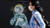 Romanian Orthodox Church Slams Posters Of Medical Workers As Saints