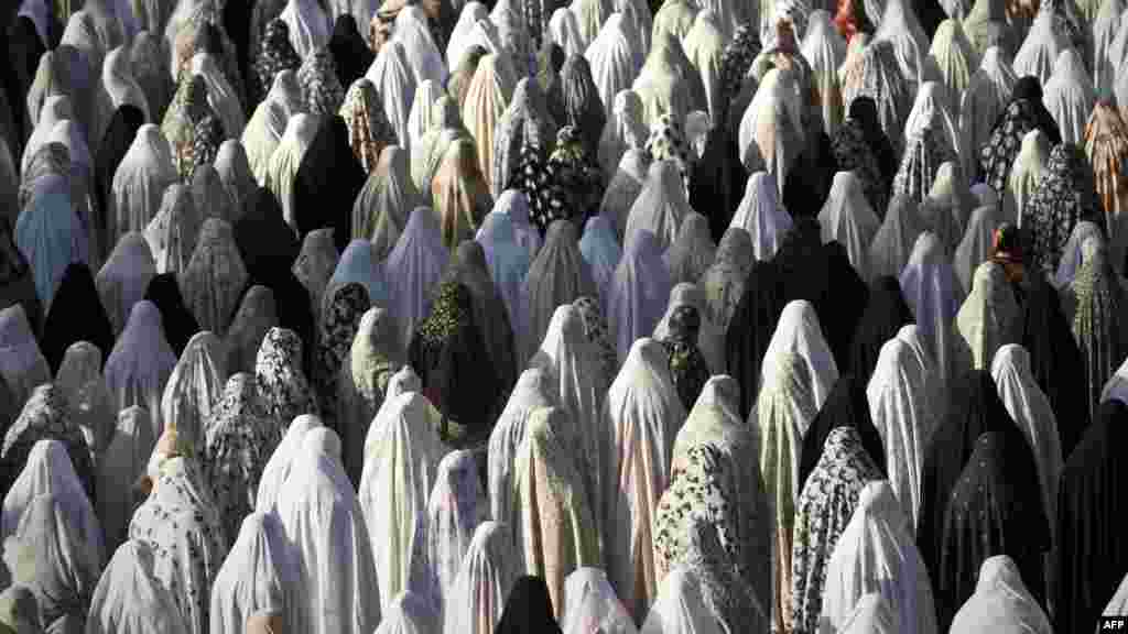 Iranian women pray on the first day of Eid al-Fitr in western Tehran. (AFP/Behrouz Mehri)