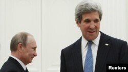 Vladimir Putin və John Kerry 