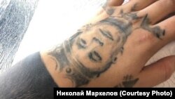 Старое тату на руке Николая Маркелова из Красноярска