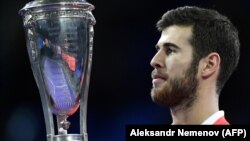 Russia's Karen Khachanov scored an upset victory over Serbia's Novak Djokovic to win the Paris Masters tennis title.