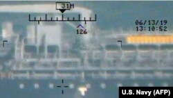 AT SEA -- This image released on June 17, 2019 by the U.S. Department of Defense in a press release is presented as a new evidence incriminating Iran in the June 13 tanker attacks in the Gulf of Oman