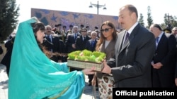 Azerbaijani President Ilham Aliyev and his wife Mehriban Aliyeva attend Norouz festivities in Baku on March 20.