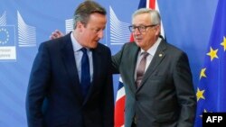 Ұлыбритания премьер-министрі Дэвид Кэмерон (сол жақта) мен Еуропа комиссиясының президенті Жан-Клод Юнкер. Брюссель, 28 маусым 2016 жыл.