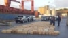 A photo purportedly shows stacks of cocaine seized from a ship docked in Cape Verde.