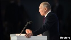 Руският президент Владимир Путин произнася годишното си обръщение към Федералното събрание в Москва, Русия, 21 февруари 2023 г. 