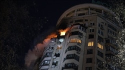 Последствия налета российских дронов на один из районов Киева