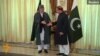 Karzai Asks Sharif To Help Peace Process