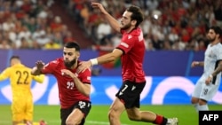 Эпизод матча между командами Грузии и Португалии.