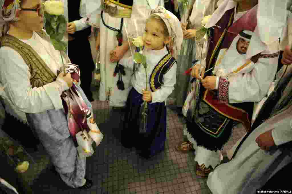 Bosnian schoolchildren attend the opening ceremony.