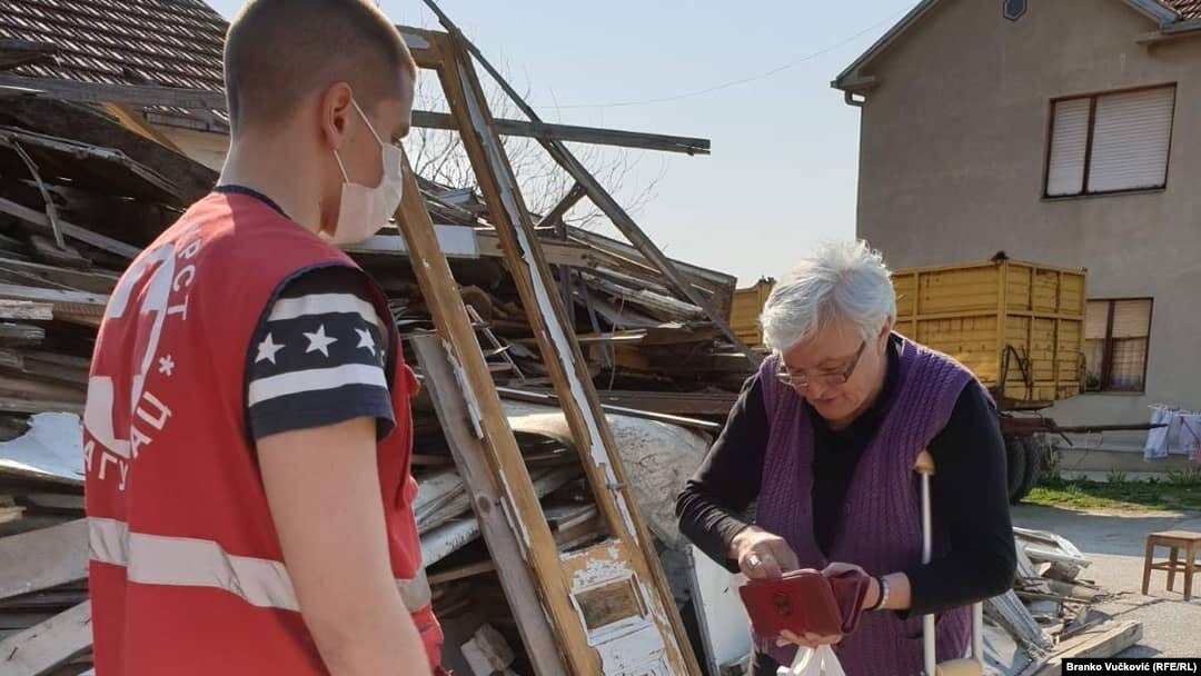 Serbia – Red Cross volunteers bring food and medicine to people who are banned from leaving their homes due to a coronavirus pandemic, Kragujevac, March 23, 2020.
