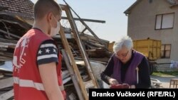 Serbia – Red Cross volunteers bring food and medicine to people who are banned from leaving their homes due to a coronavirus pandemic, Kragujevac, March 23, 2020.