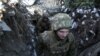 Украински войници в укрепление близо до окупираните от проруски сепаратисти зони в източна Украйна. Февруари, 2021 г.
