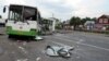 Russia -- People check the crash scene on July 13, 2013 near the village of Oznobikhino outside Moscow after at least 18 people were killed and at least 40 injured when a gravel truck smashed into a bus packed with passengers.